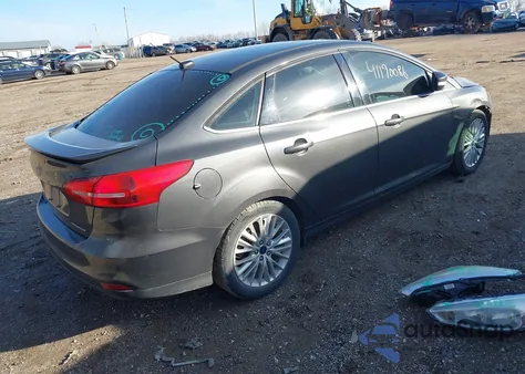 2015 Ford Focus Titanium from USA, damaged, VIN 1FADP3J27FL259029